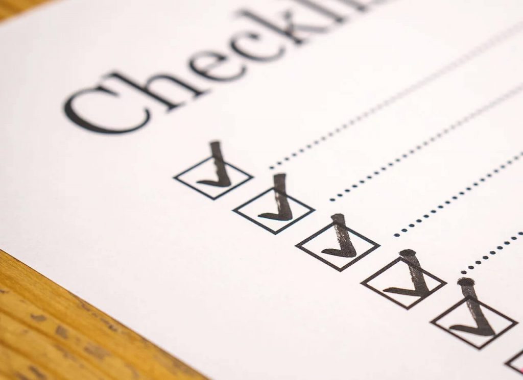 A white piece of paper with check boxes.
