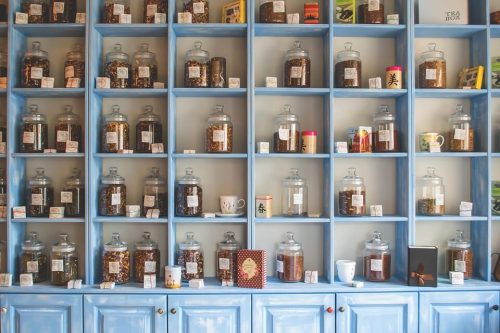 wall of herbal jars in chinese shop